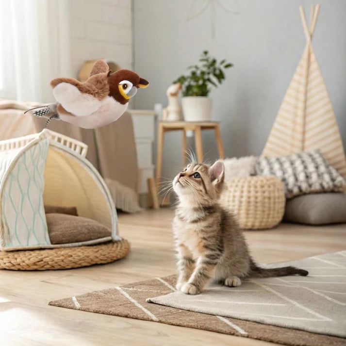 kitten-flapping-bird-toy-cat-tree